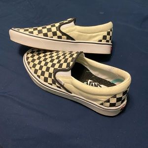 Checkered slip-on vans